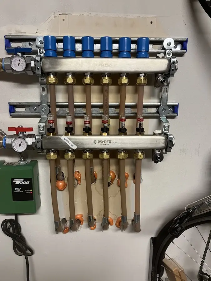 Plumber performing Water Heater Repair at a residential property in South Milwaukee